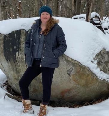 Marlee Tyska by snowy boulder